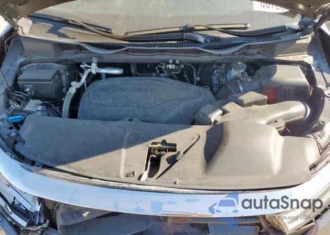 2022 Honda Odyssey Touring z USA, uszkodzony, nr VIN 5FNRL6H83NB063744